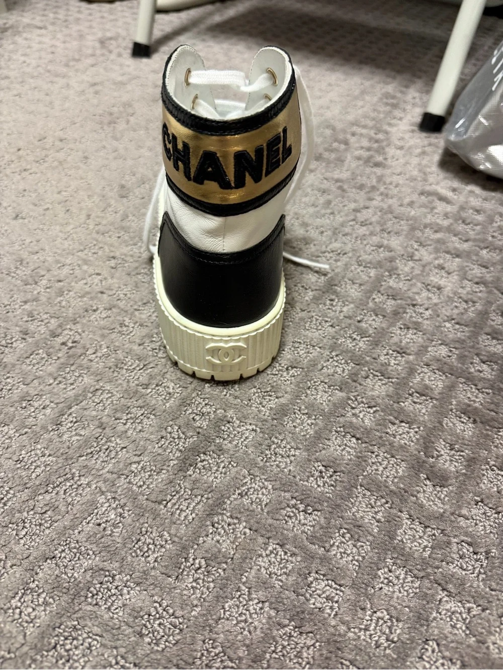 CHANEL White and Black High-Top Logo Sneaker